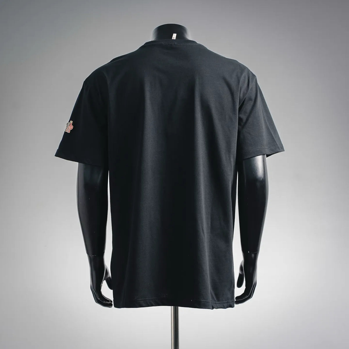 Moncler black short-sleeve T-shirt, back view with small left logo