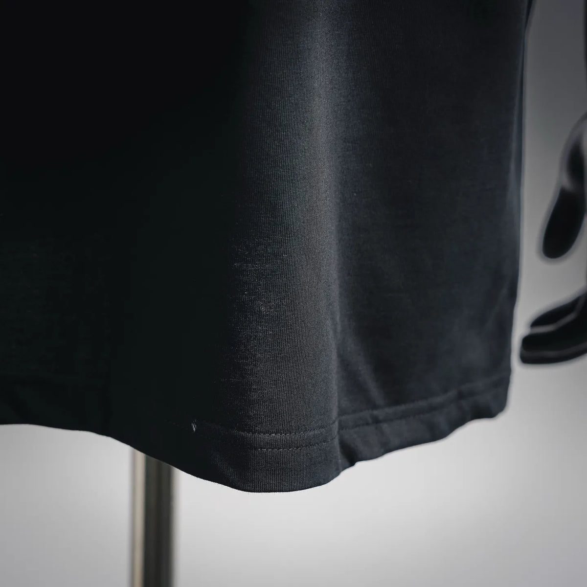 Moncler black T-shirt hem with stitched bottom edge