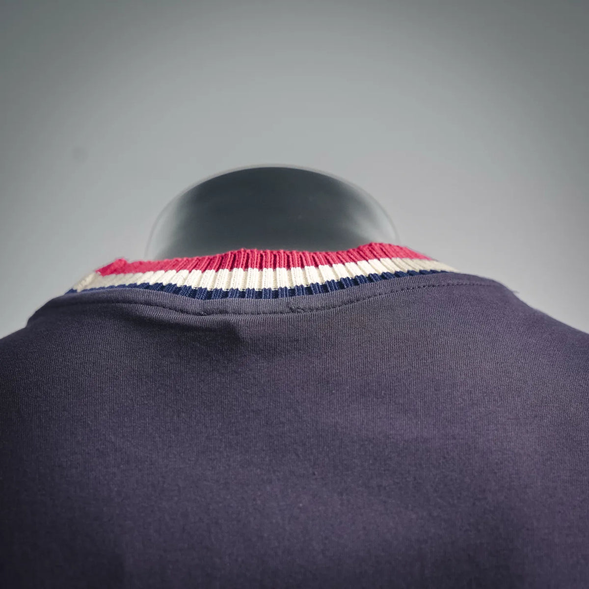 Moncler T-shirt collar with ribbed red, white, and blue stripe and neckline seam
