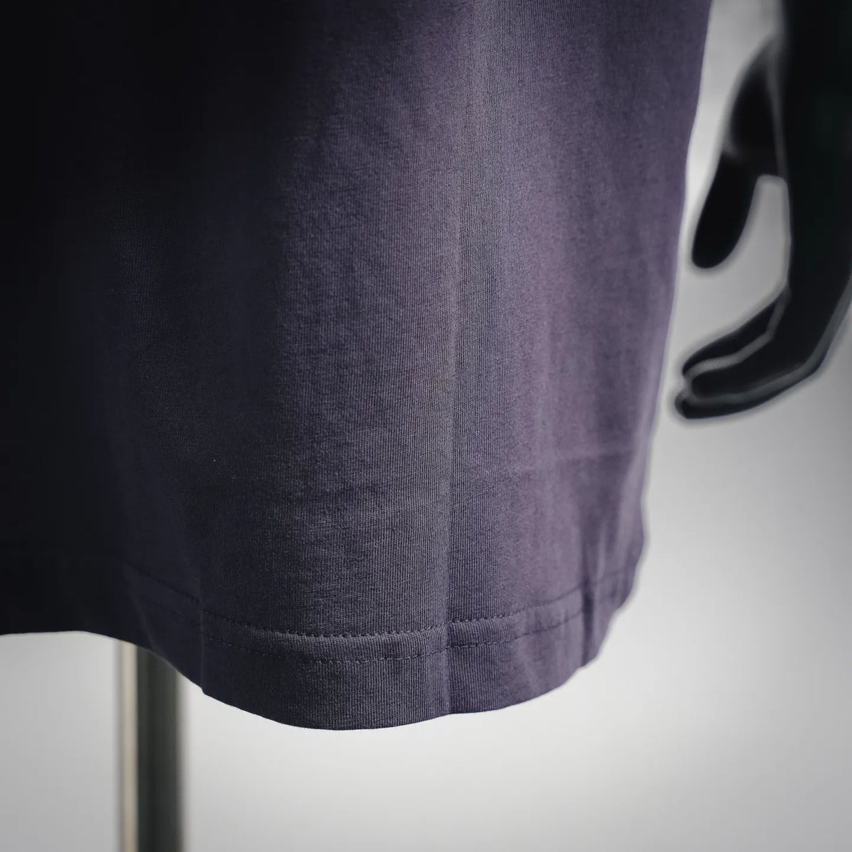 Moncler T-shirt hem and side seam in dark navy knit fabric
