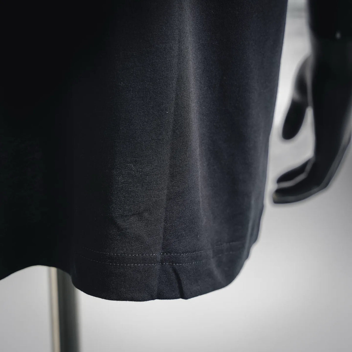 Moncler black T-shirt hem with stitched bottom edge