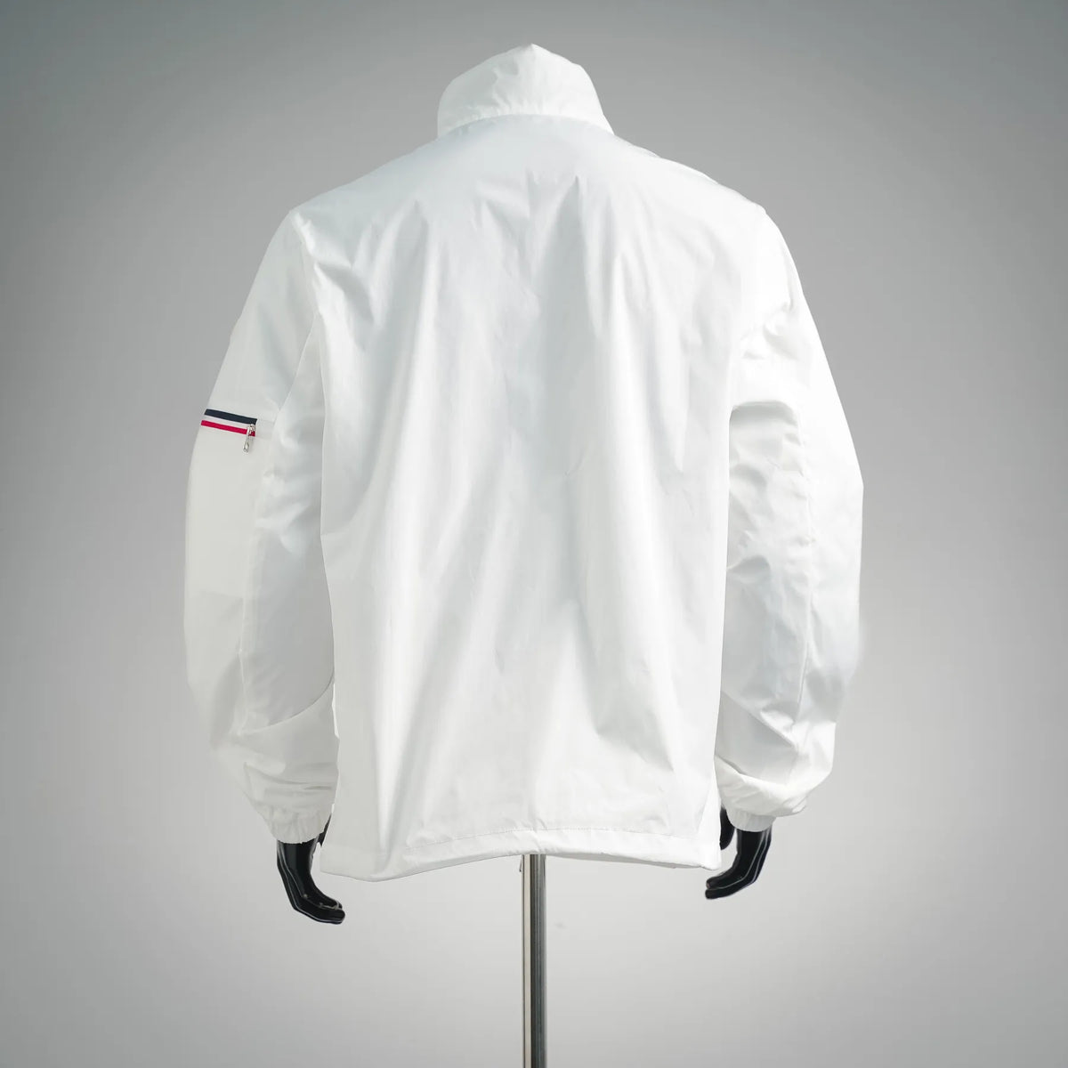 Moncler white hooded coat, back view with elastic cuffs