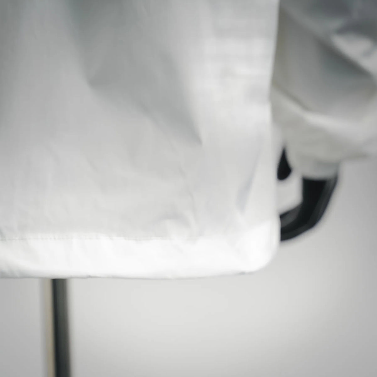 Moncler white coat fabric and lower hem detail