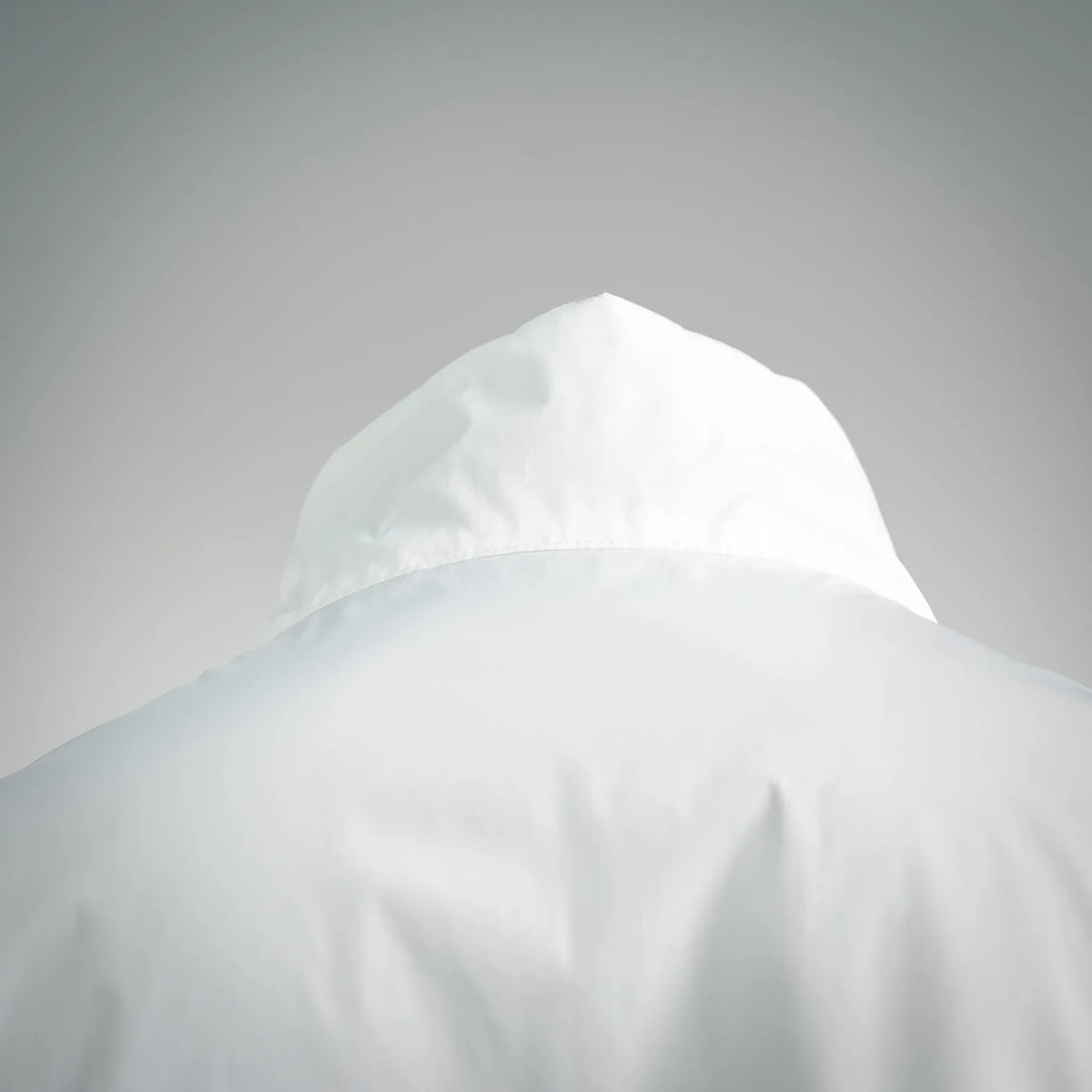 Moncler white hood with fabric texture close-up