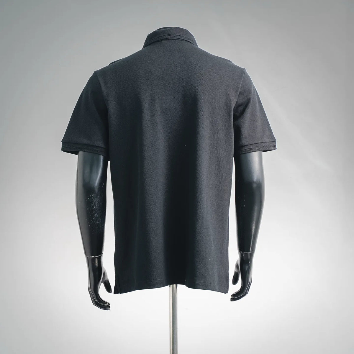 Moncler short-sleeve polo shirt, dark back view with collar and straight hem