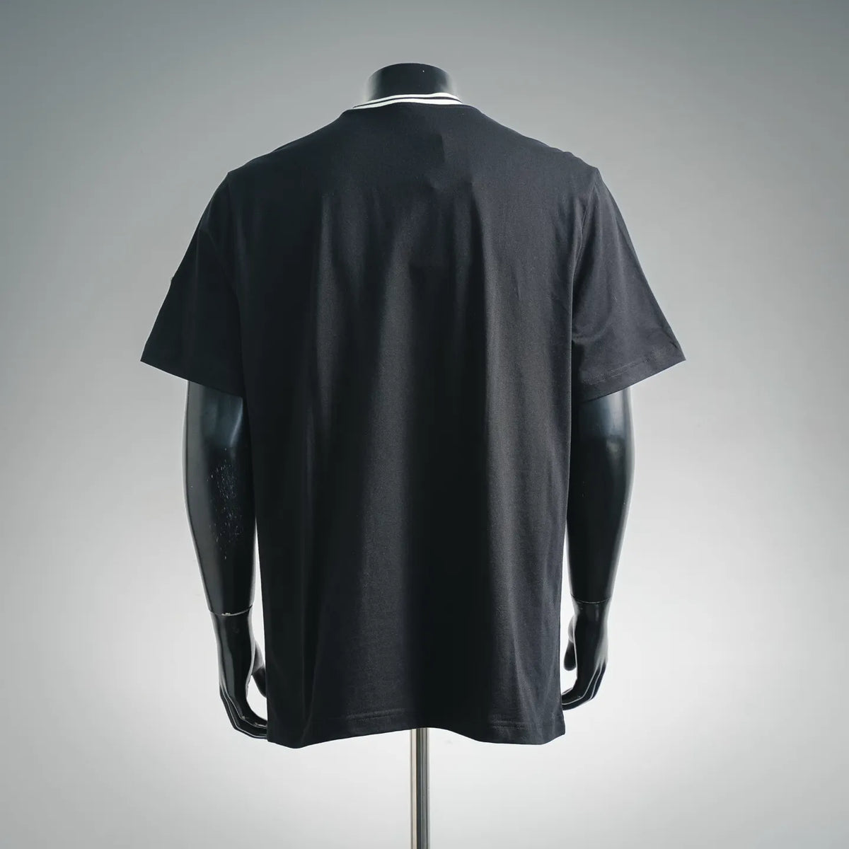 Black short-sleeve T-shirt back view with crew neck rib trim