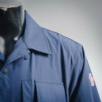 Blue jacket sleeve with side flag patch and chest flap pocket