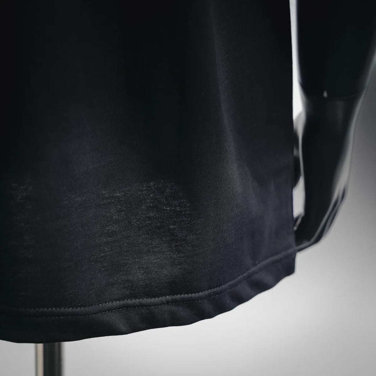 Moncler dark gray/black T-shirt hem with visible stitching detail