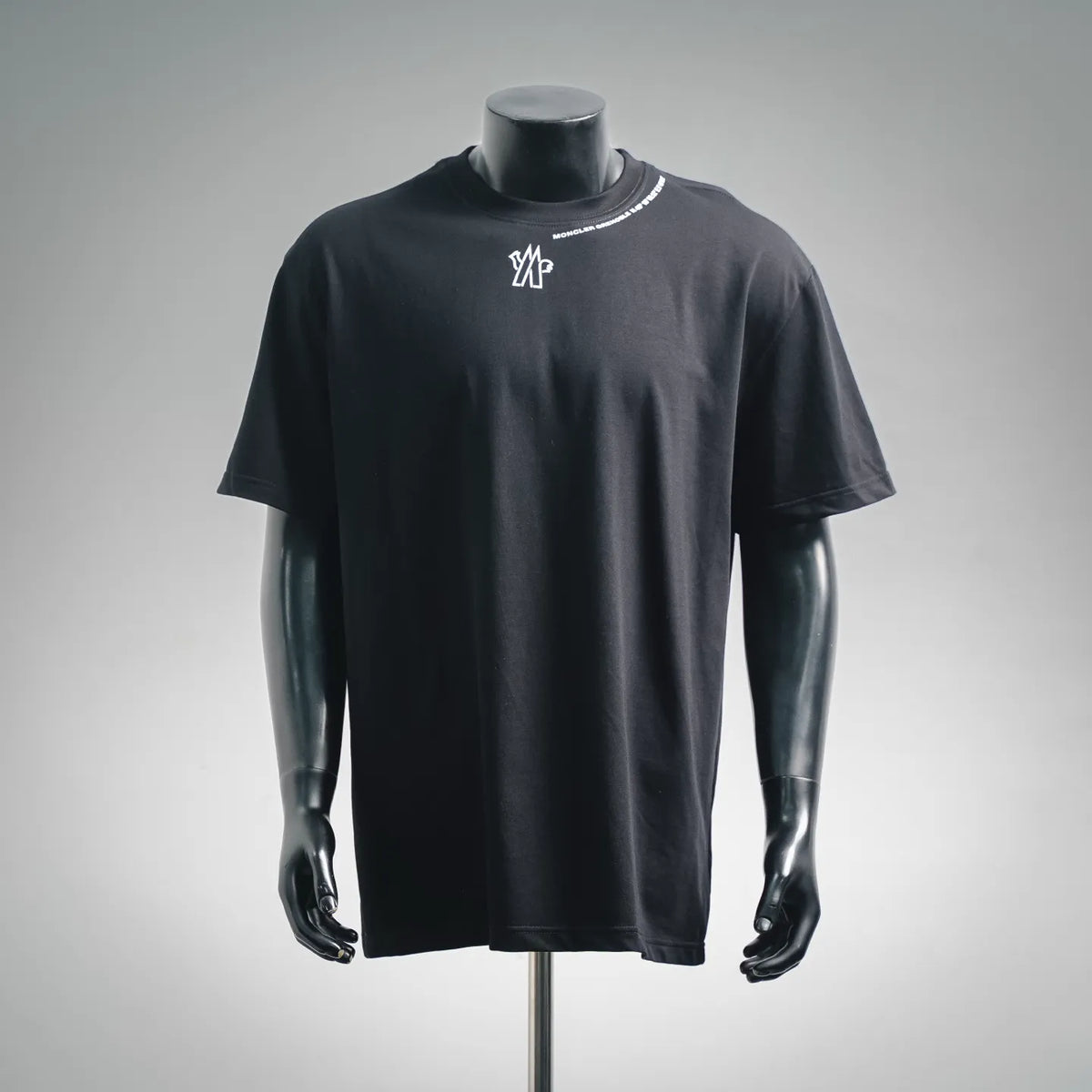 Black short-sleeve crewneck T-shirt with Moncler logo on the chest