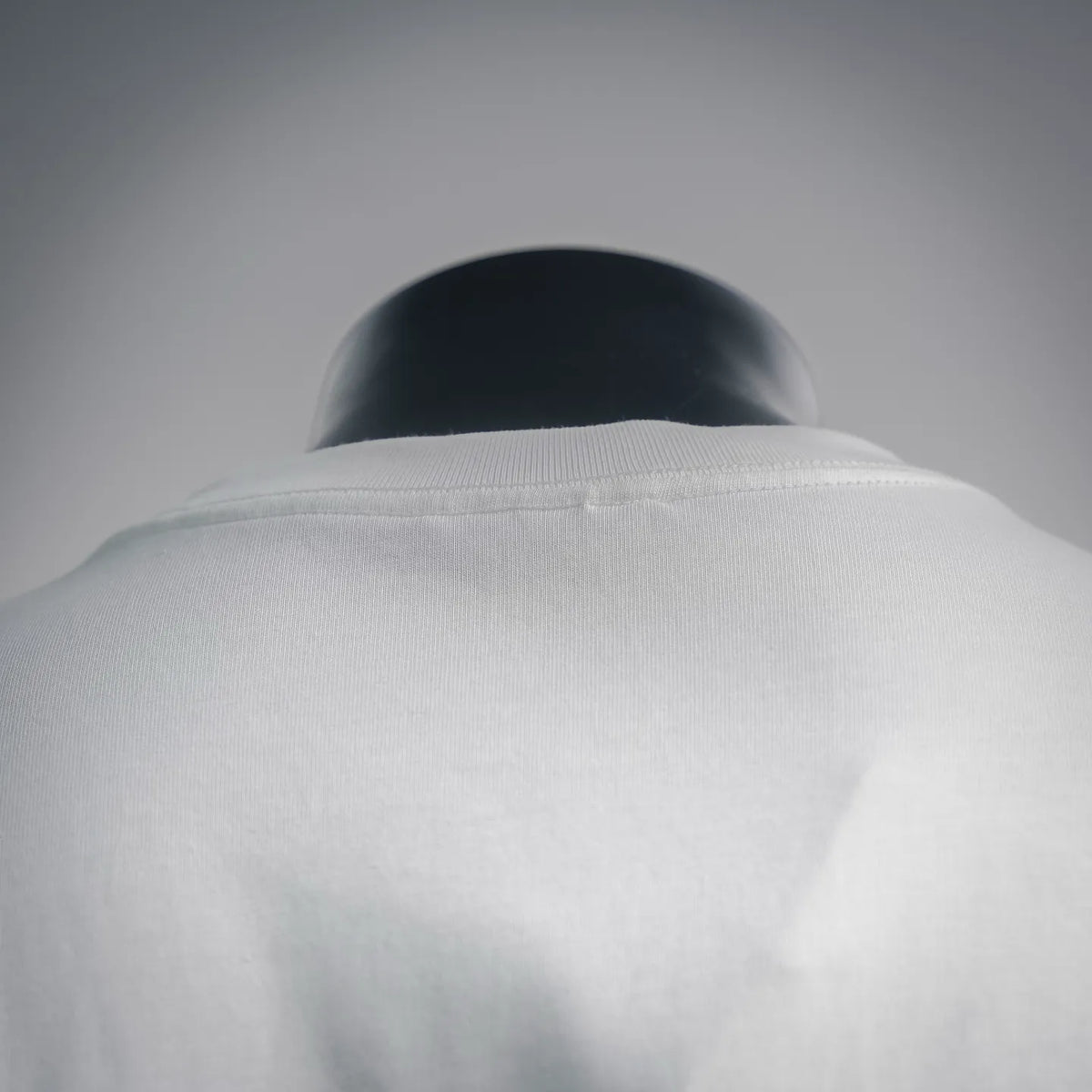 White Moncler short-sleeve T-shirt neckline close-up