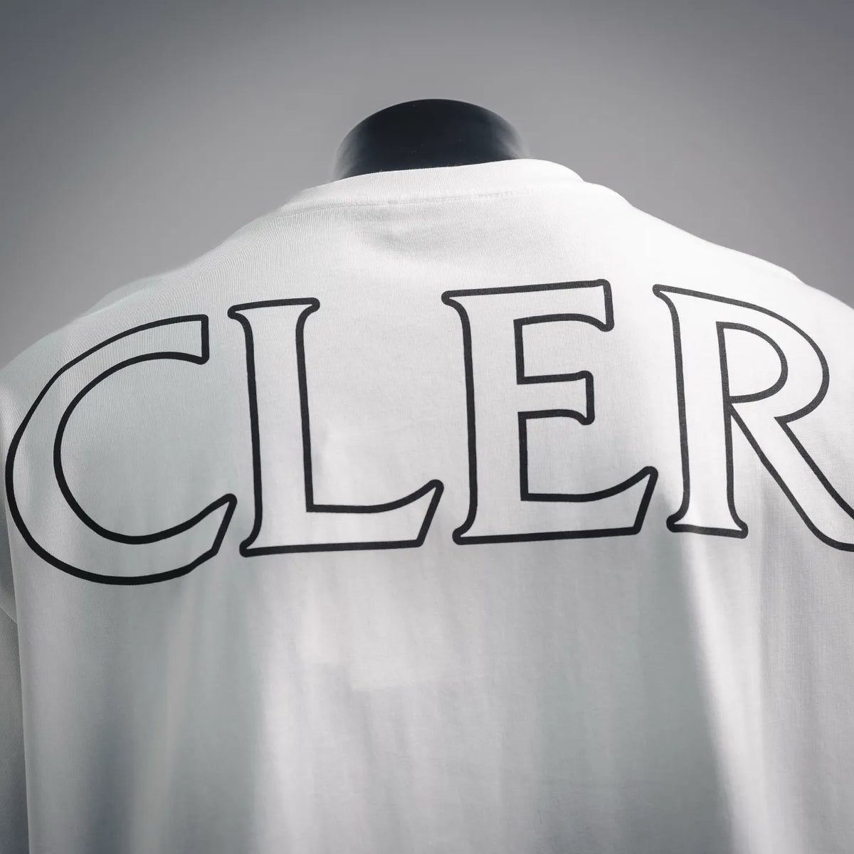 White Moncler short-sleeve T-shirt back with large CLER-style graphic lettering.