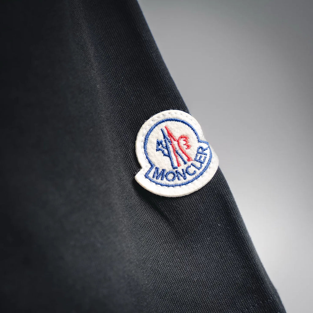 Moncler black T-shirt sleeve with round brand patch