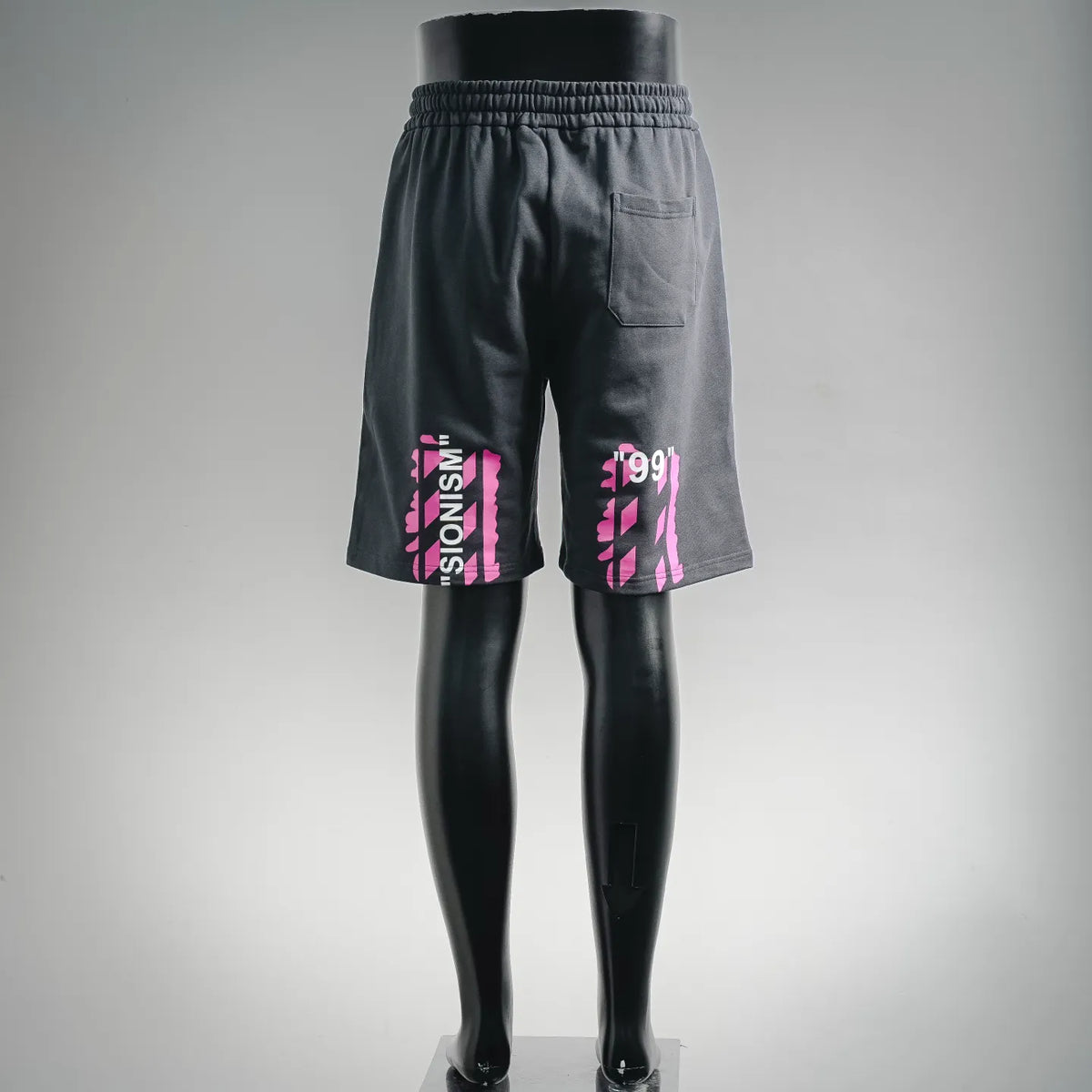 Off-White dark shorts with back pocket and bold multicolor logo print