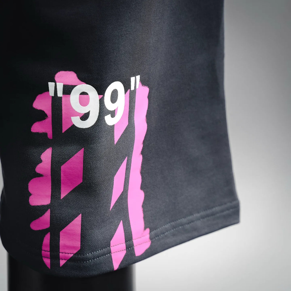 Off-White dark shorts side graphic print at hem