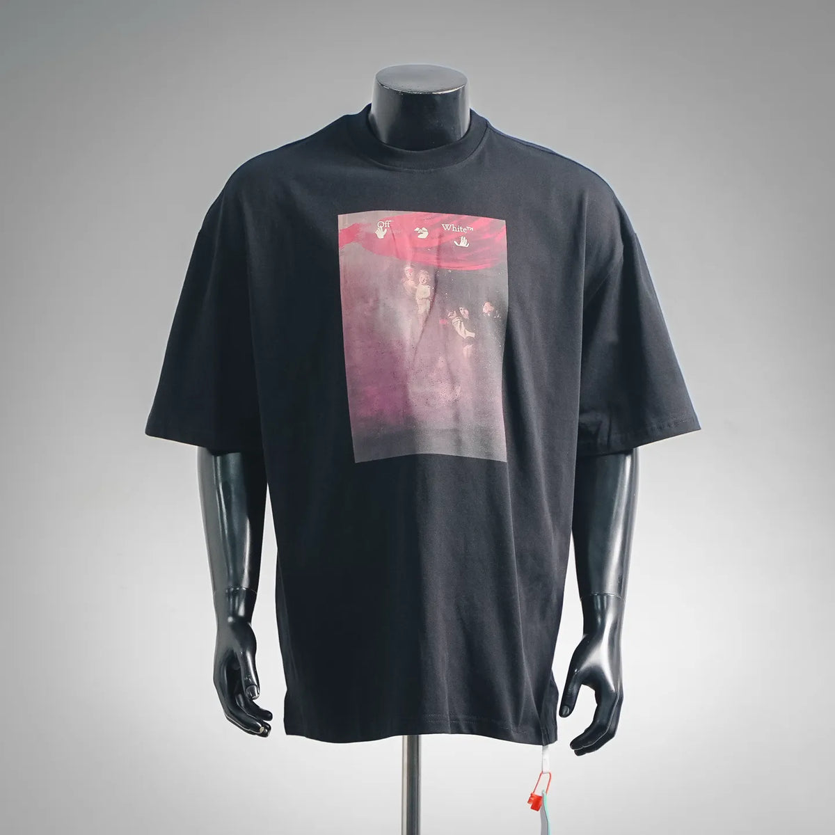 Black short-sleeve T-shirt with large pink graphic print on the front