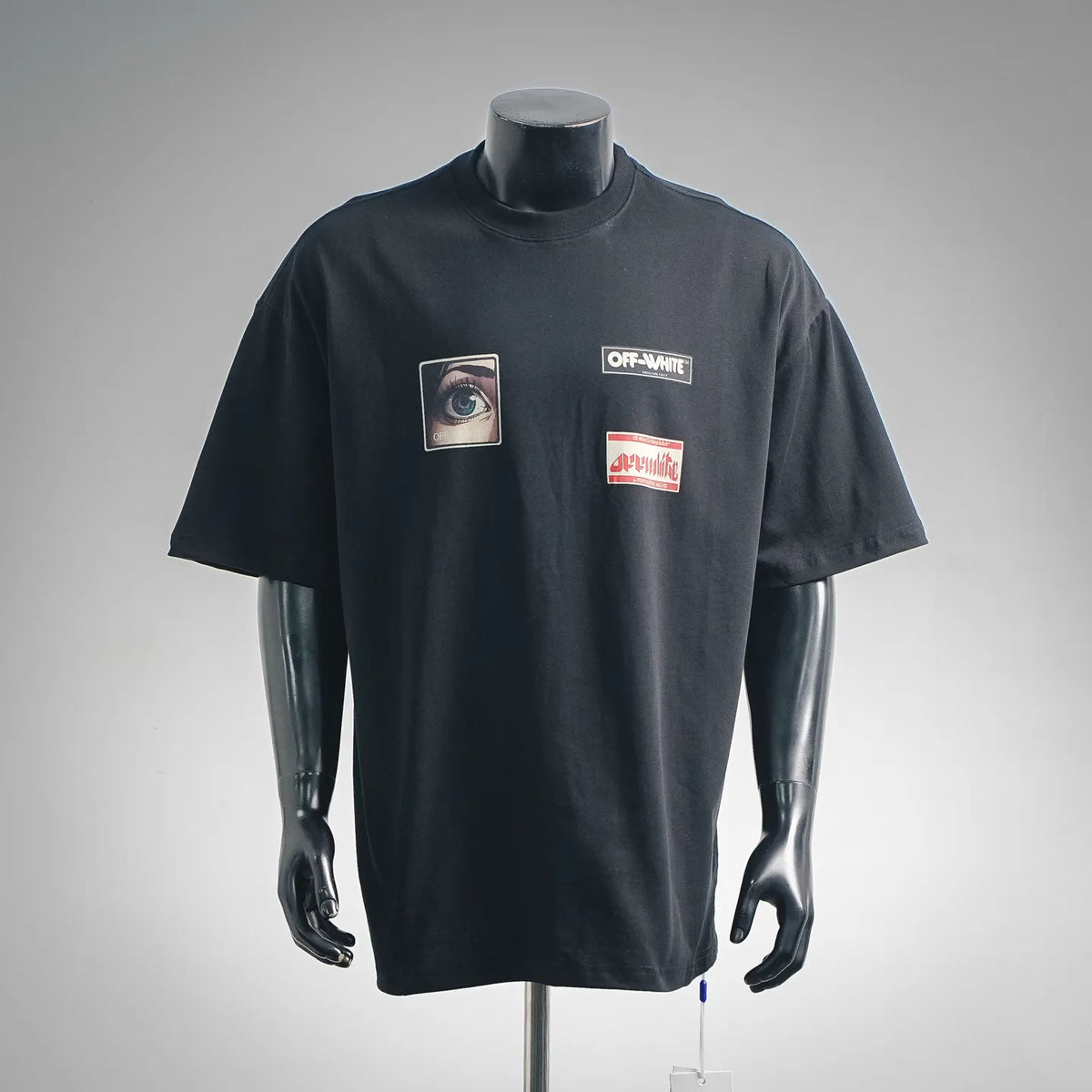 Black short-sleeve T-shirt with front graphic patches and Off-White branding