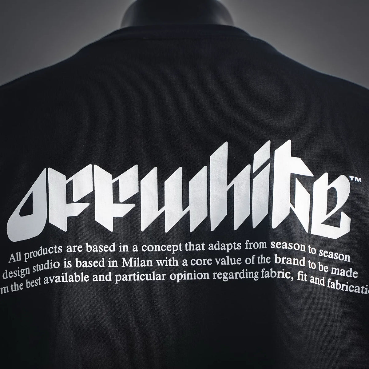 Black T-shirt back with large white Off-White logo graphic lettering
