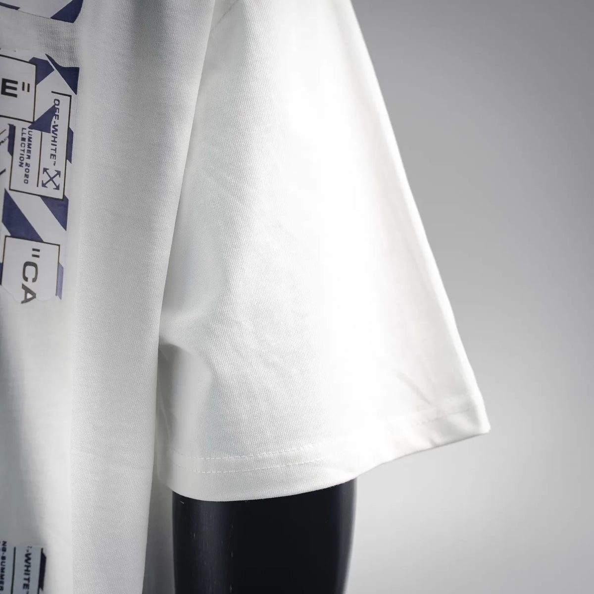 Off-White off-white T-shirt hem and side seam close-up