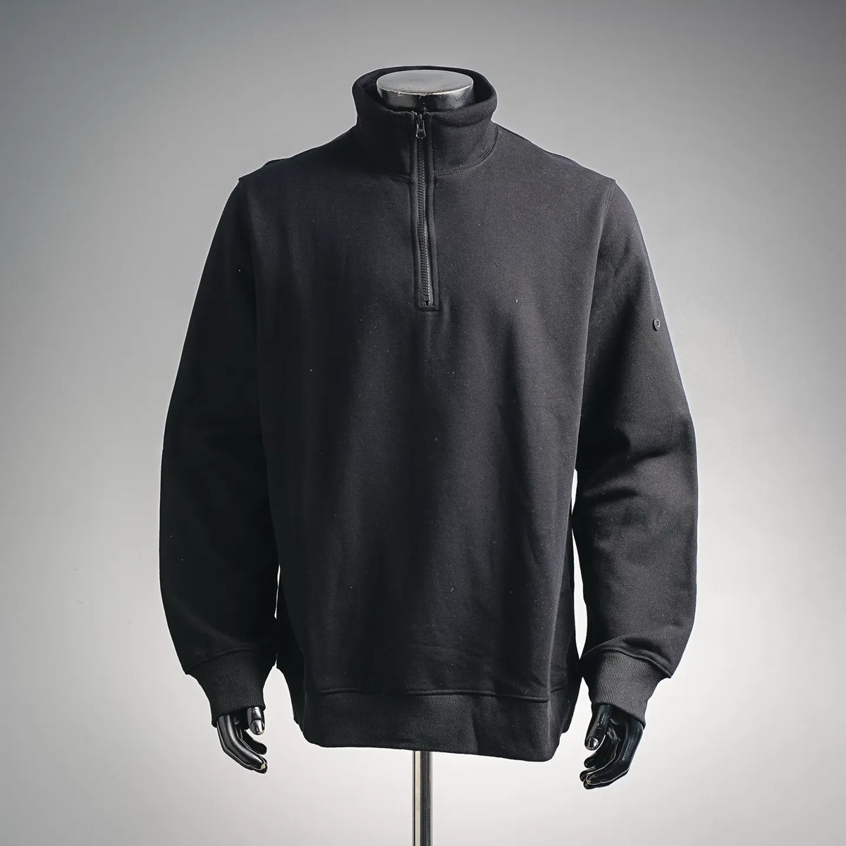 Black zip-up sweatshirt with stand collar and half-length zipper