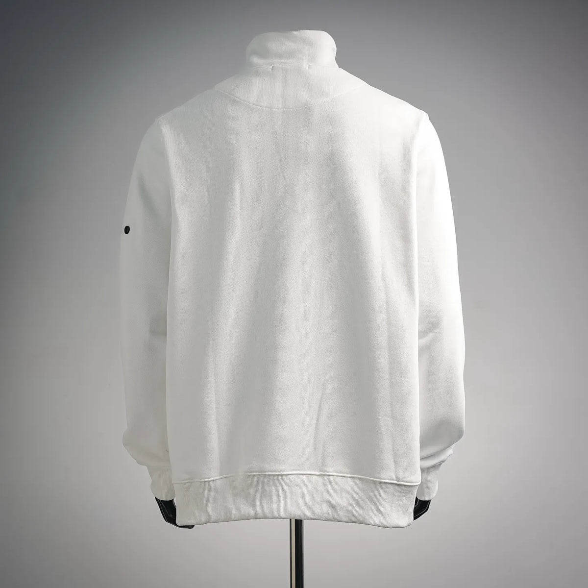 White quarter-zip sweatshirt, back view with ribbed hem and high collar