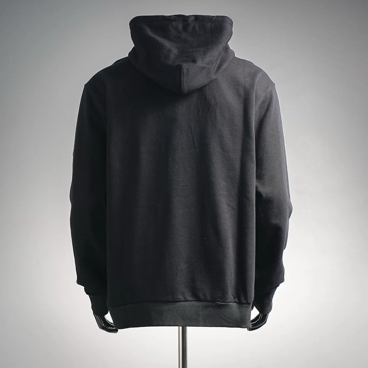 Black long pullover hoodie with attached hood