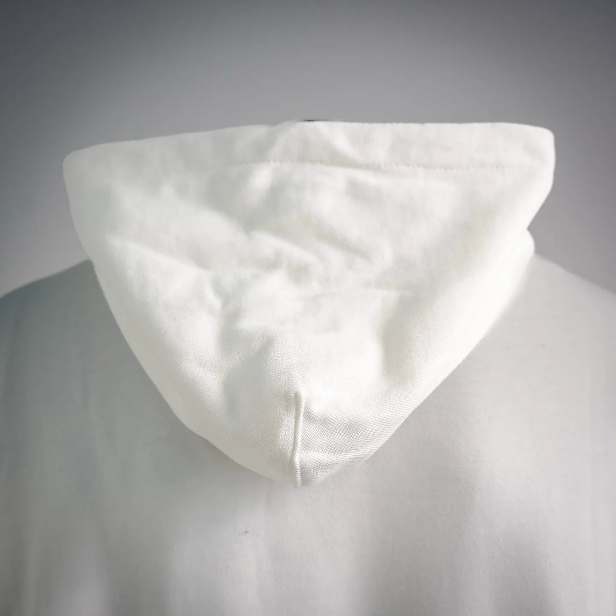 White hoodie hood detail with drawstring