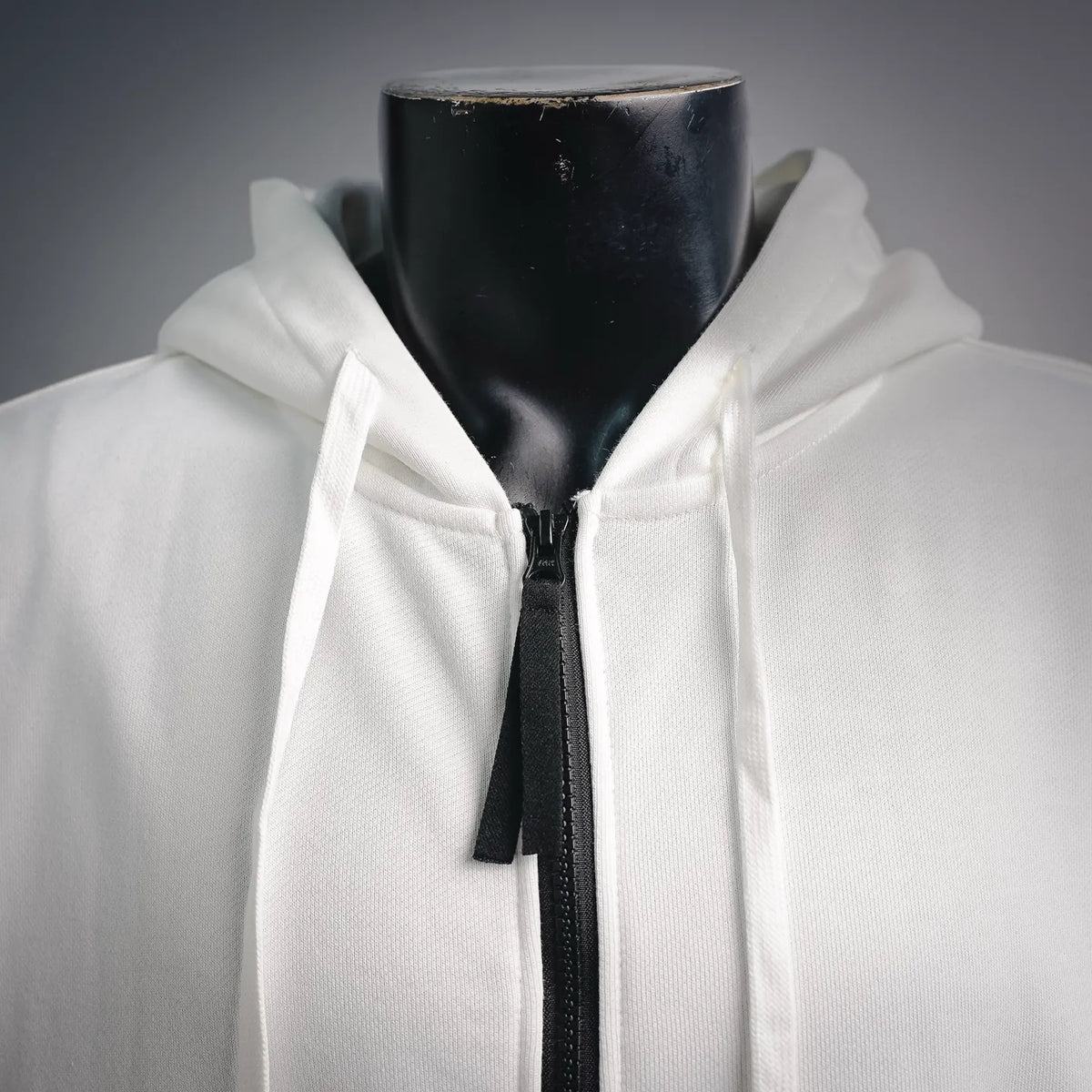 Stone Island zip-up hoodie coat, white, hood close-up with black zipper and pull tab