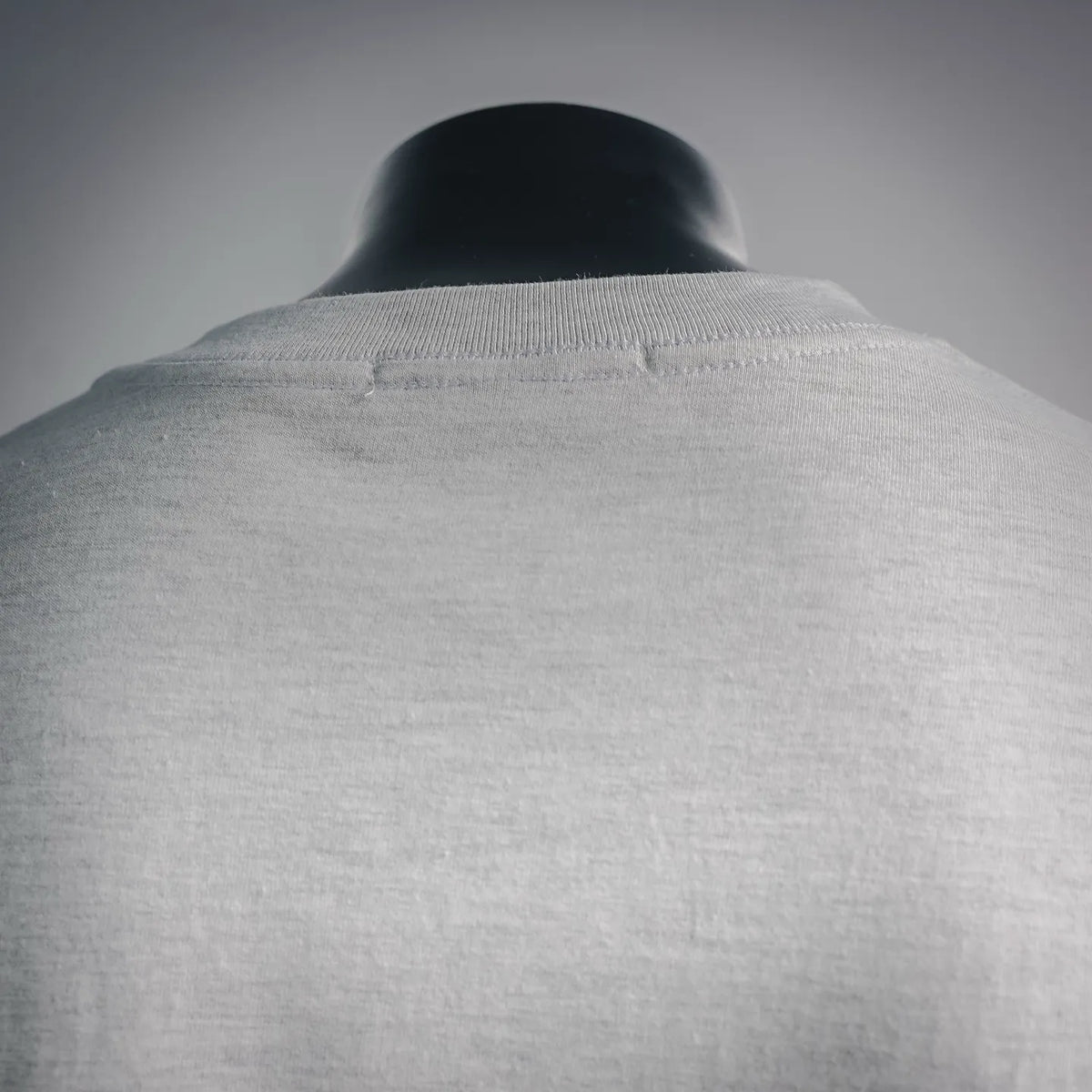 Stone Island white long-sleeve T-shirt neckline and upper back fabric detail