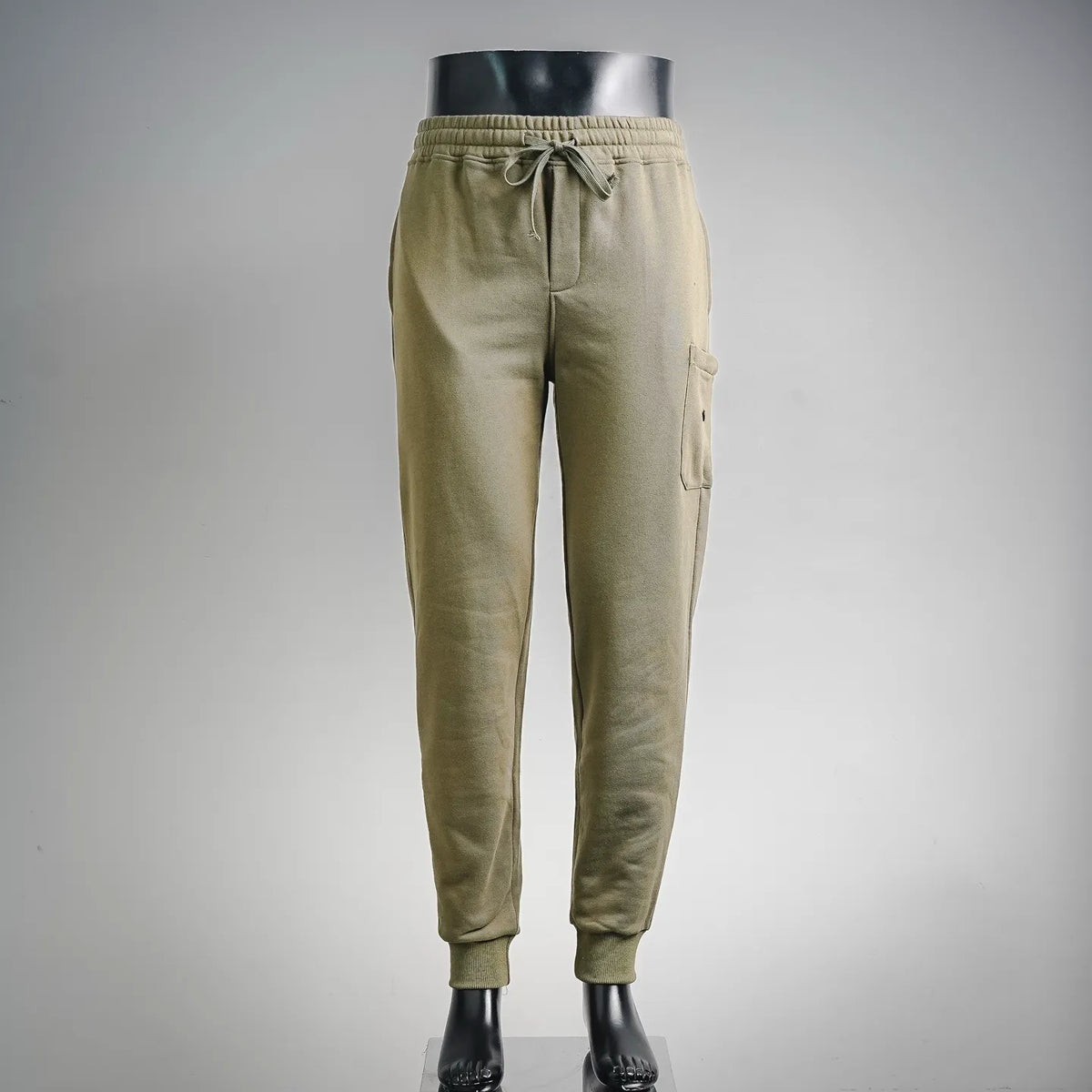 Olive jogger pants with elastic waistband and drawstring, side pockets, cuffed hems
