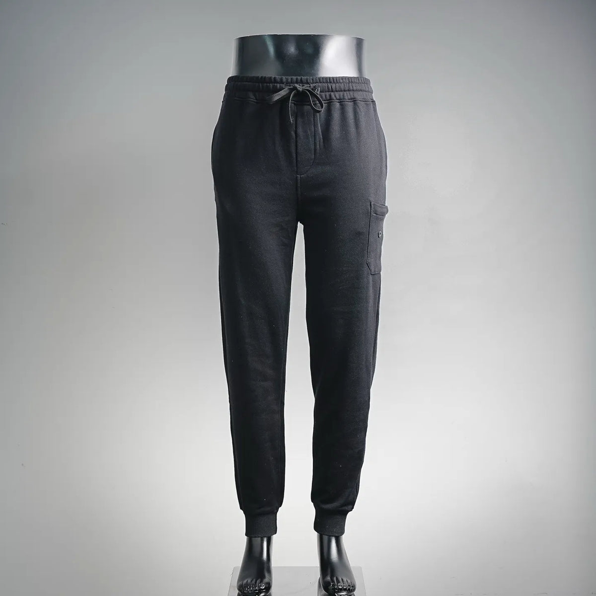 Stone Island black jogger pants with elastic waistband and cuffed hems