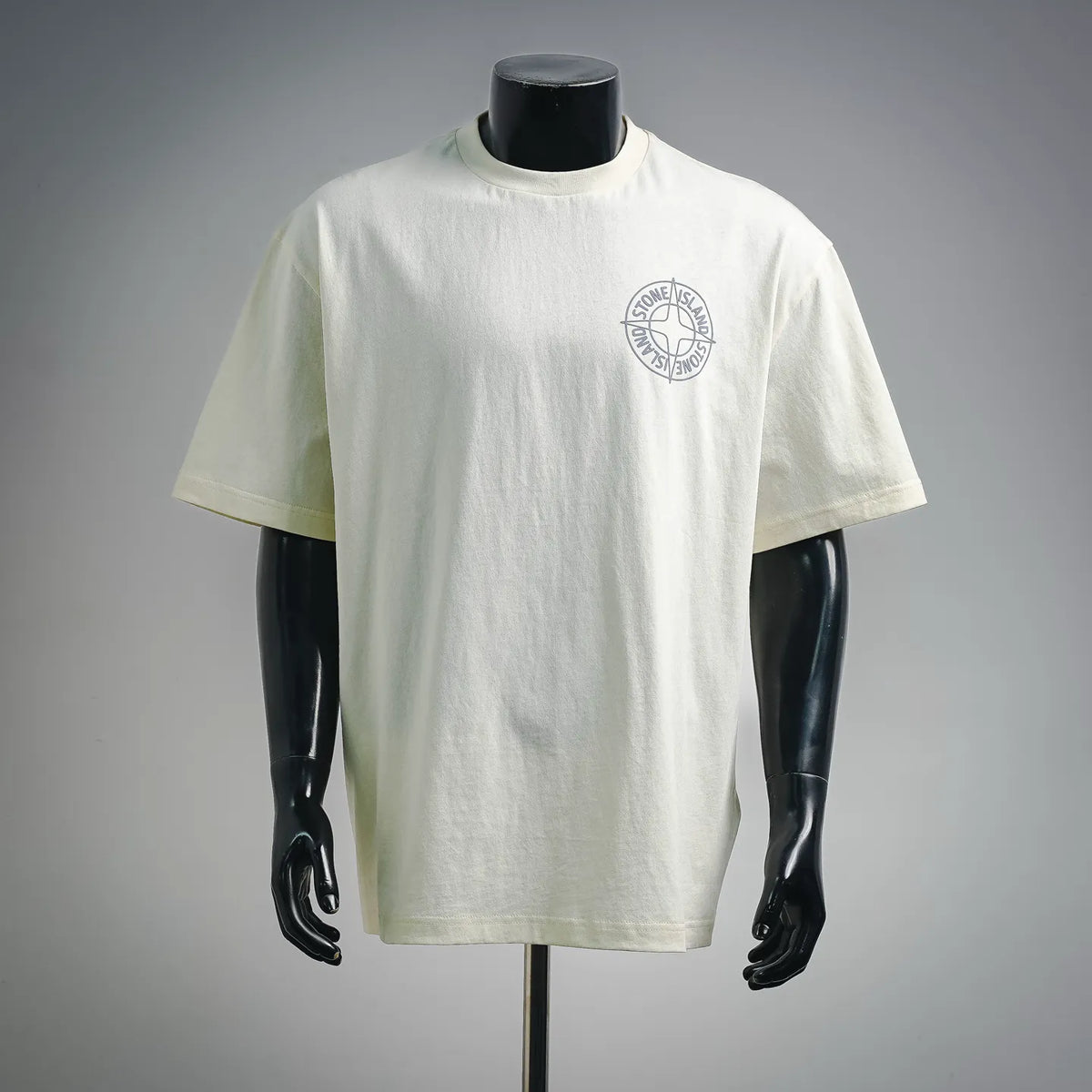Light cream short-sleeve T-shirt with small Stone Island chest logo patch