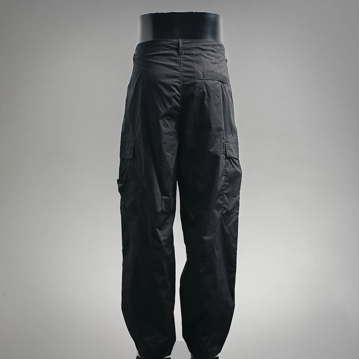 Black pants with relaxed leg and gathered hem cuffs