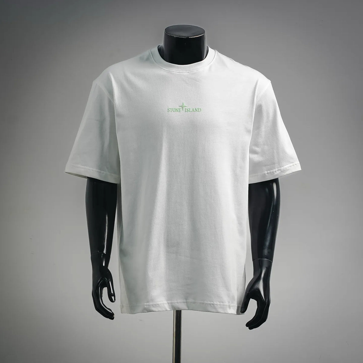 White short-sleeve T-shirt with small Stone Island logo on the chest