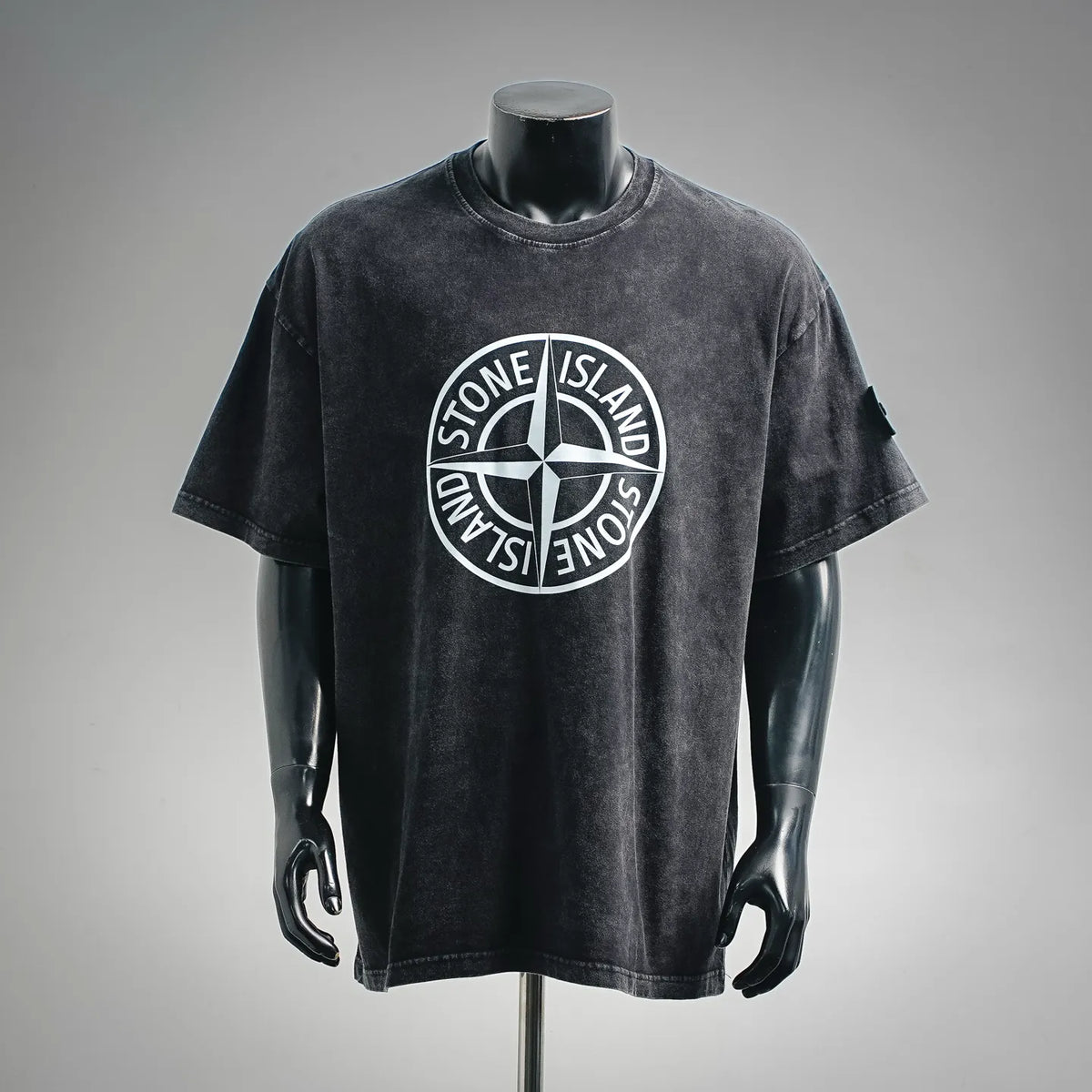 Stone Island graphic T-shirt, black short-sleeve with large circular logo on chest