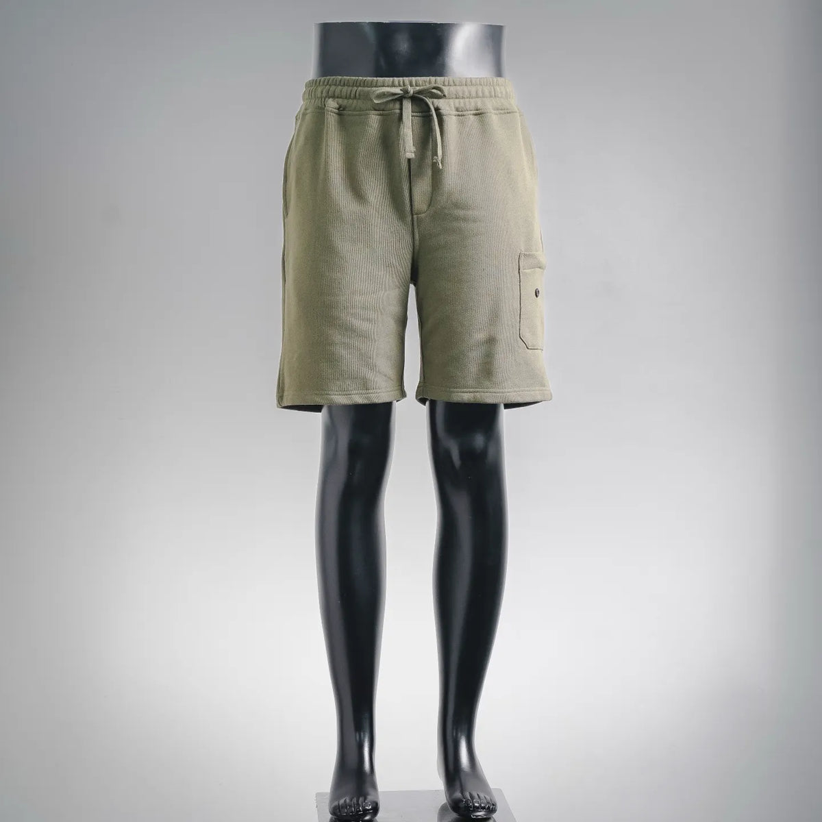 Stone Island olive green drawstring shorts with side pockets and elastic waistband