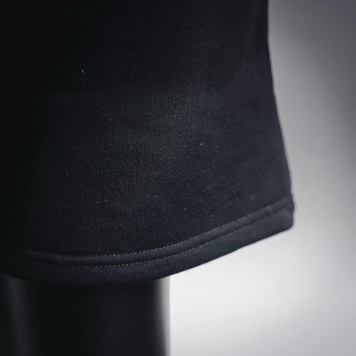 Black shorts cuff and hem close-up