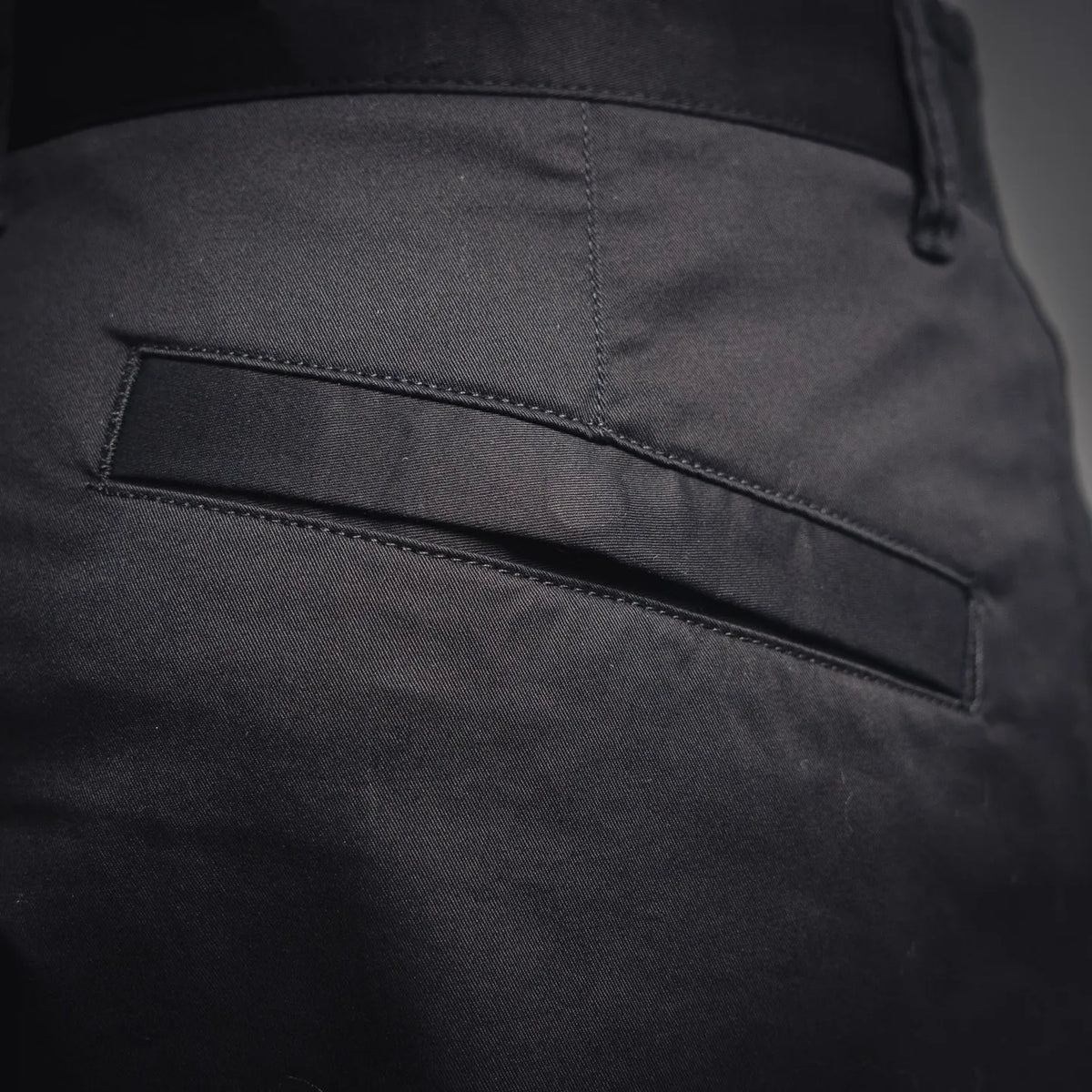 Stone Island black shorts with stitched pocket flap and inner pocket panel