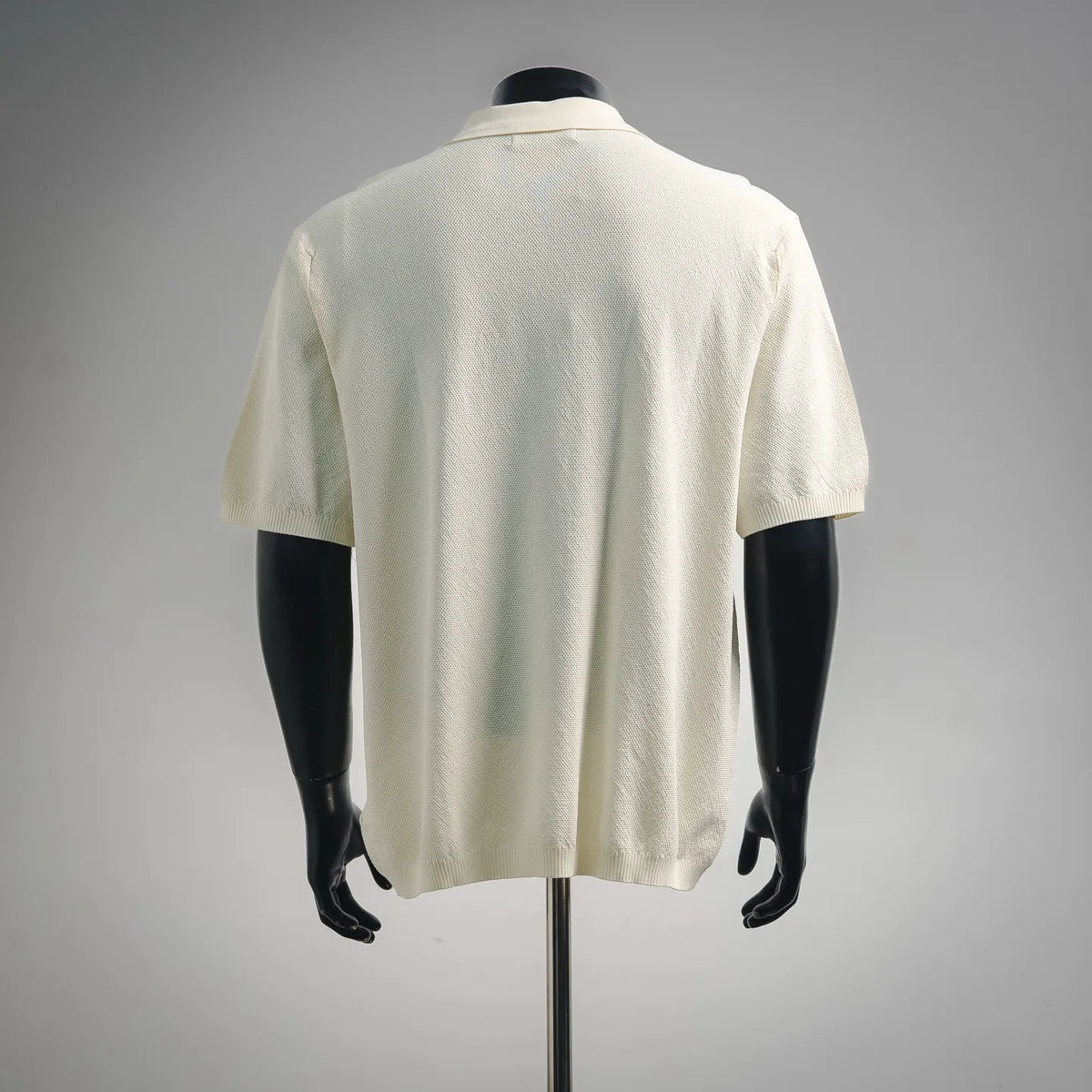 Stone Island short-sleeve polo shirt, off-white textured knit with plain back.
