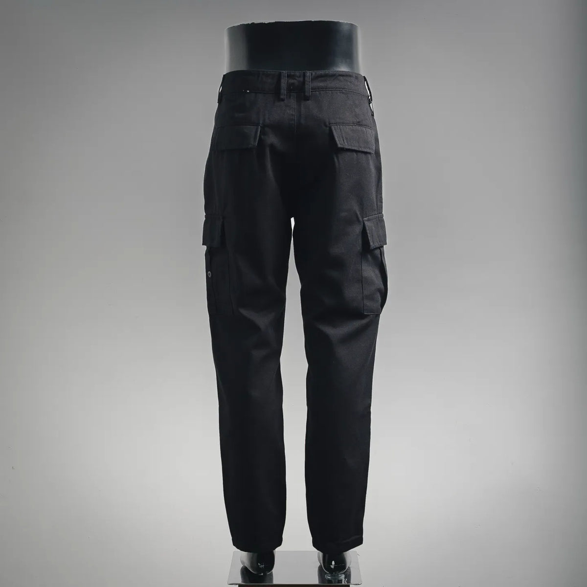 Stone Island black cargo pants, back view, with cargo pocket details
