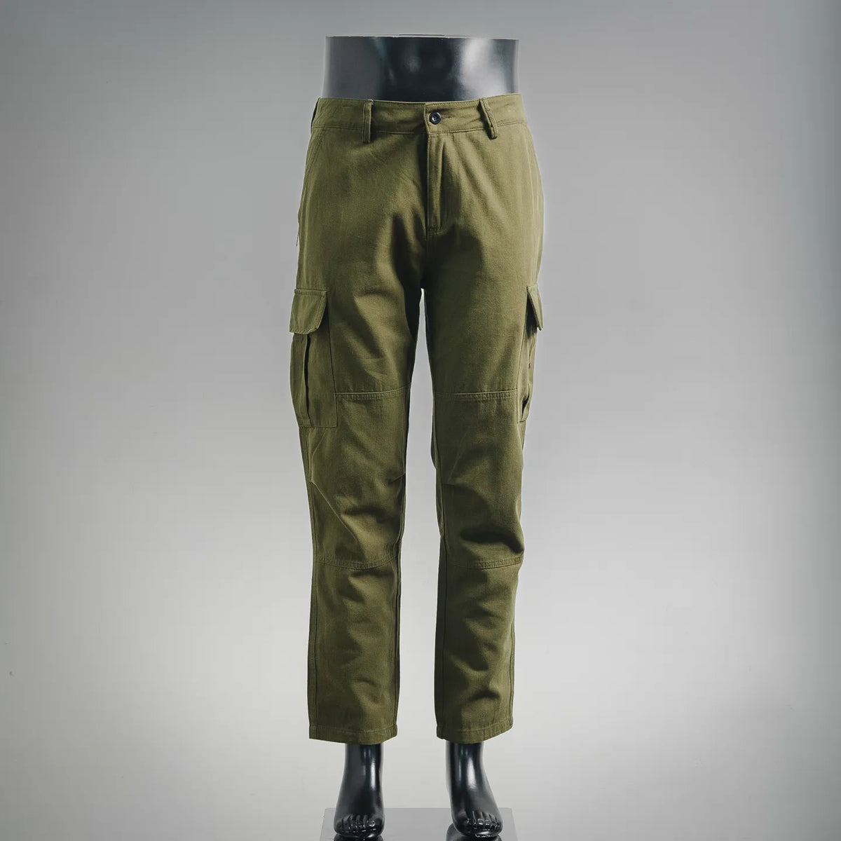 Stone Island cargo pants in olive green with ankle cuffs and button closure