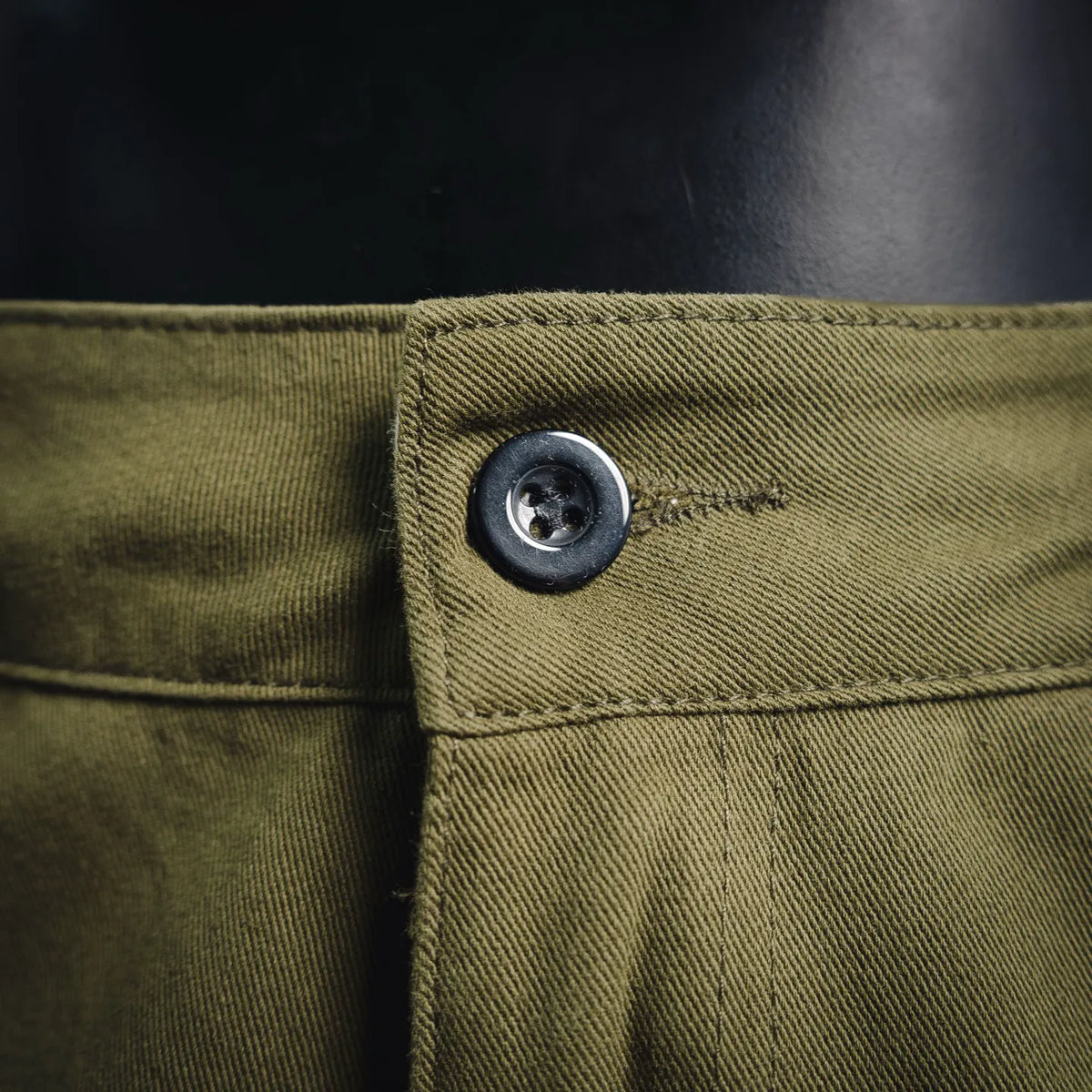Stone Island cargo pants button and waistband detail in olive green