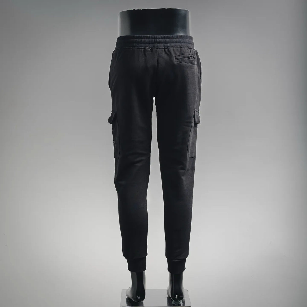 Black Stone Island cargo jogger pants with ribbed ankle cuffs