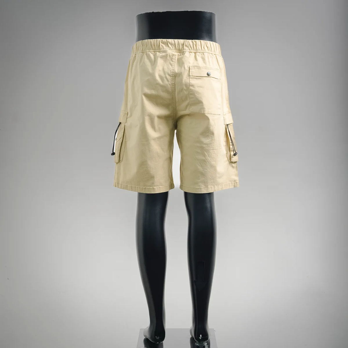 Beige cargo shorts with back panel seam and side tie pockets