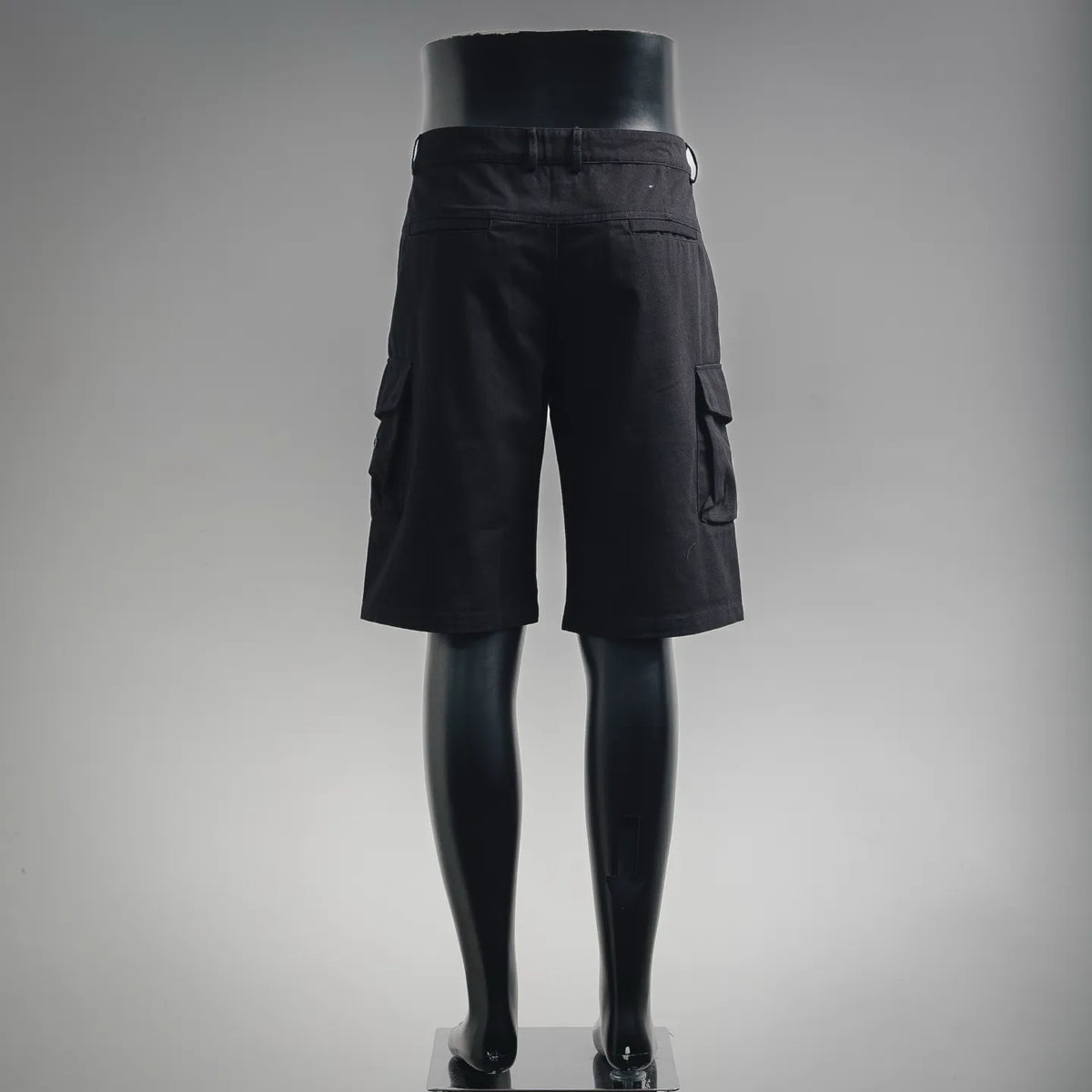 Stone Island black cargo shorts, rear view with belt loops and cargo pockets