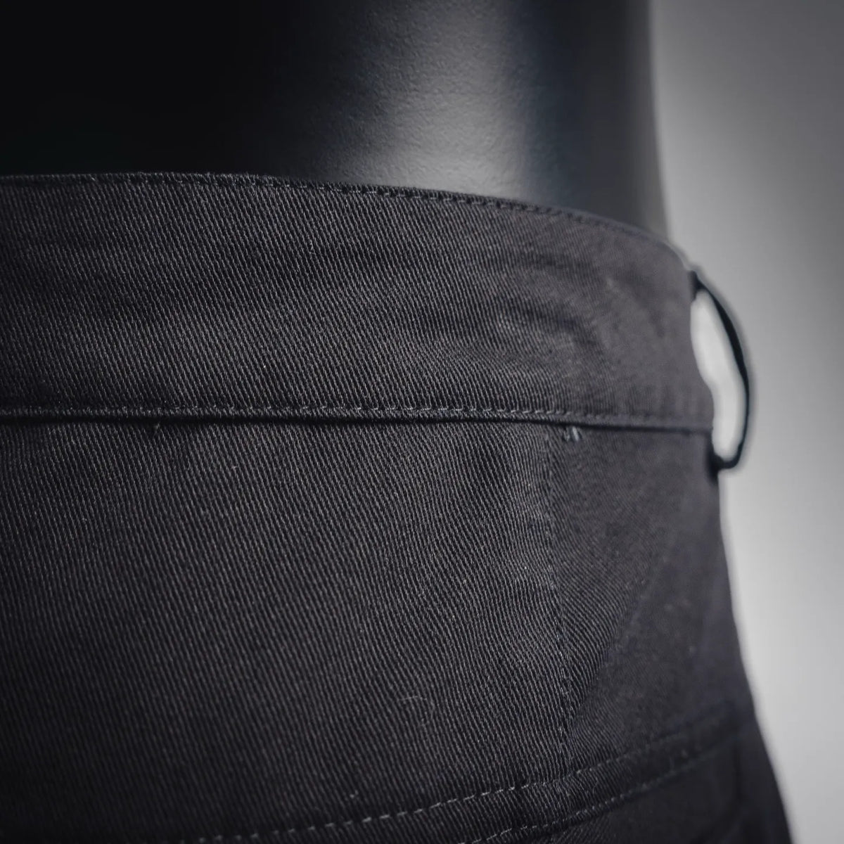Stone Island black shorts side pocket with visible stitching close-up
