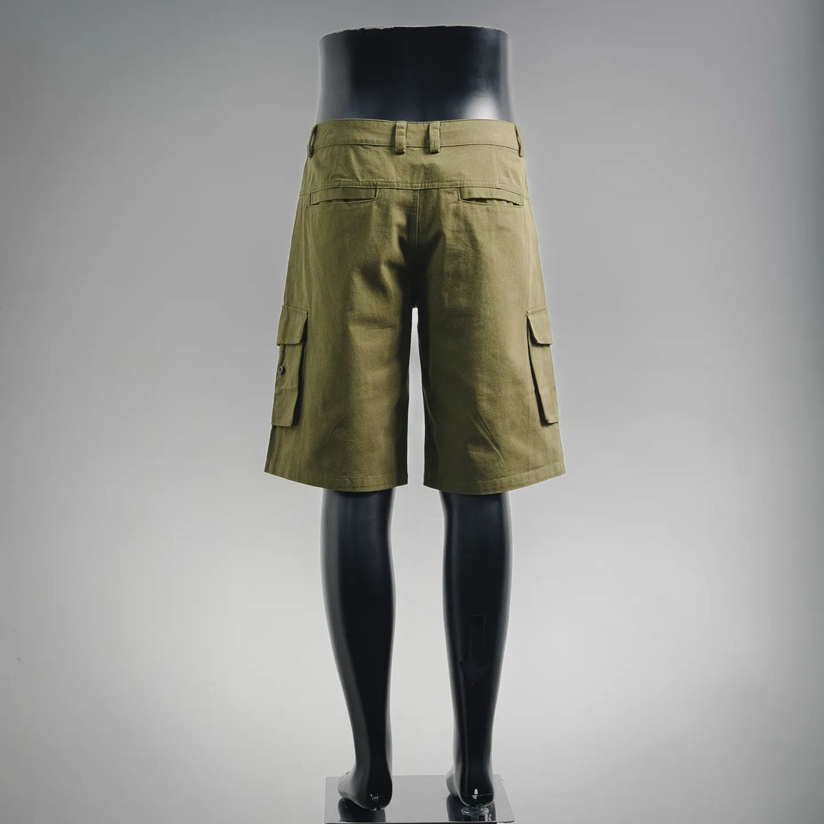 Stone Island olive cargo shorts, back view with belt loops and flap cargo pockets
