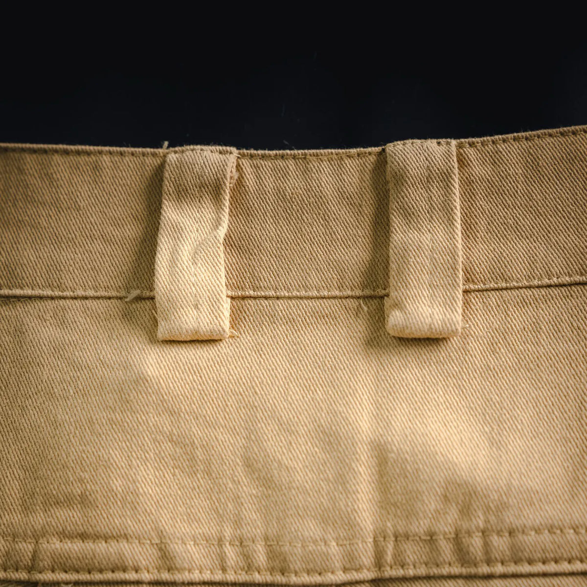 Stone Island beige shorts waistband with stitched center panel and belt loops