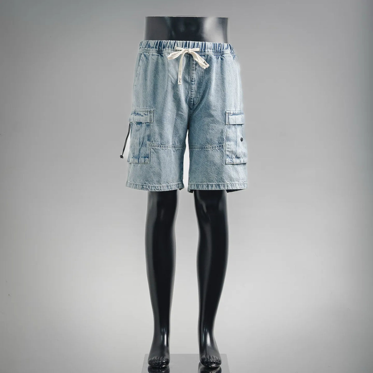 Light blue denim cargo shorts with elastic waistband, drawstring, and side pockets