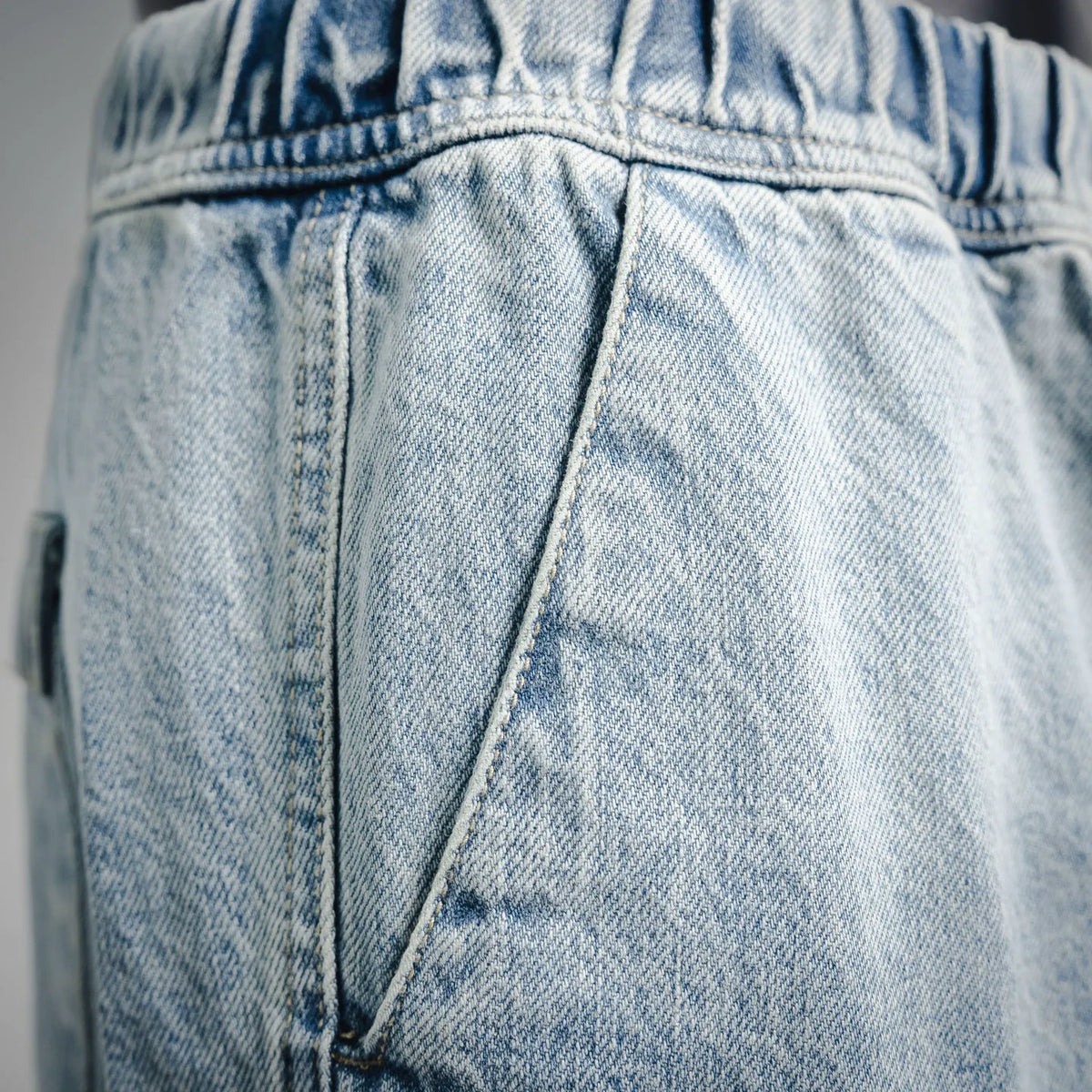 Light blue denim shorts with front seam panel and elastic waistband