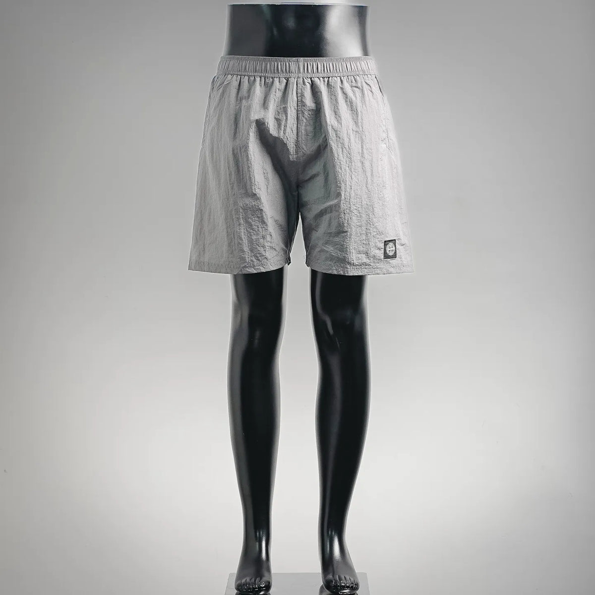Stone Island light gray drawstring shorts with elastic waistband and side pockets